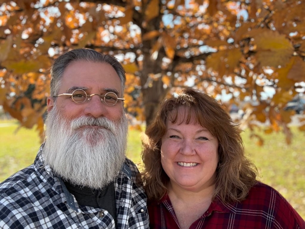 Couple taking picture outside